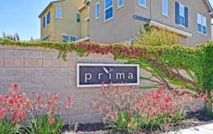 Prima Homeowners Association sign on wall